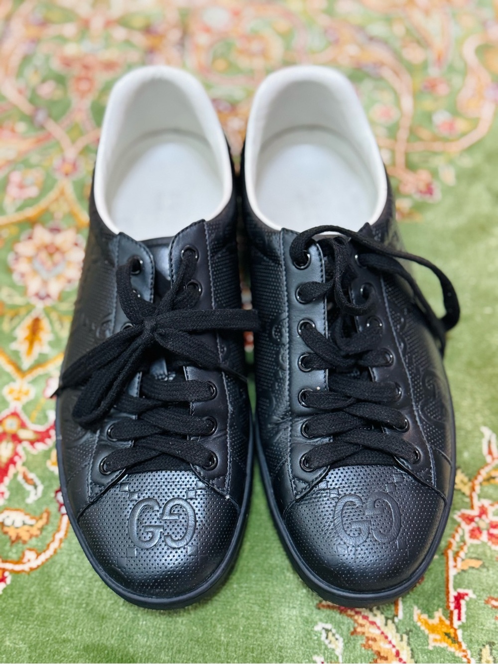 Gucci Black Leather GG Embossed Low-Top Sneakers